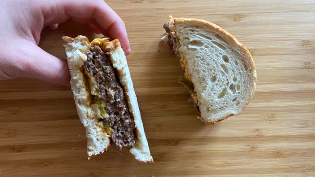 hand holding whopper melt