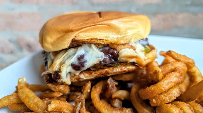 Arby's Big Game Burger with curly fries