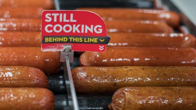 Convenience store hot dogs cooking on rollers