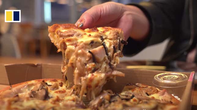Image for article titled Forget Snakes on a Plane—Try Snakes on a Pizza