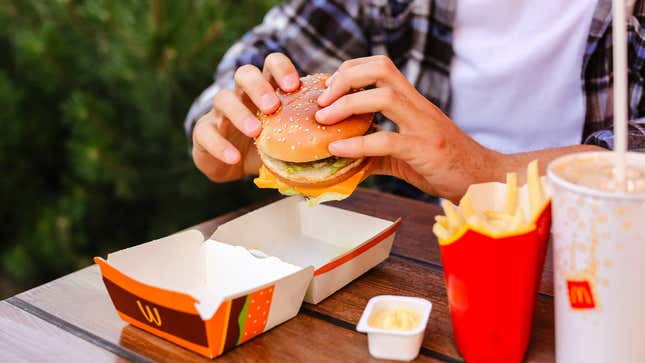 hand holding burger