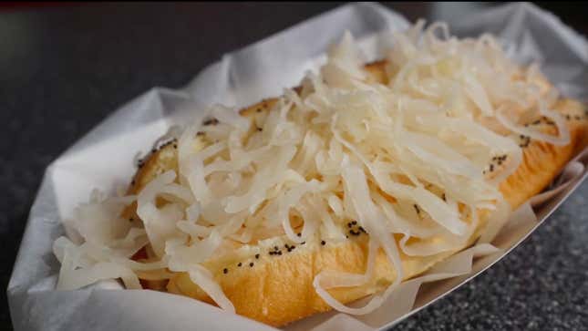reuben-topped hot dog