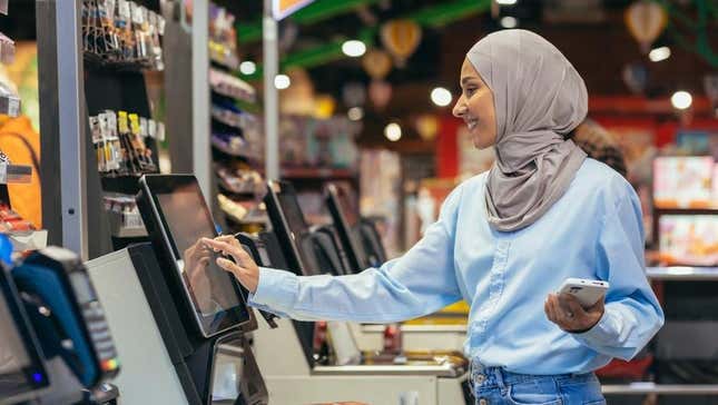 Shopper finishing self checkout payment