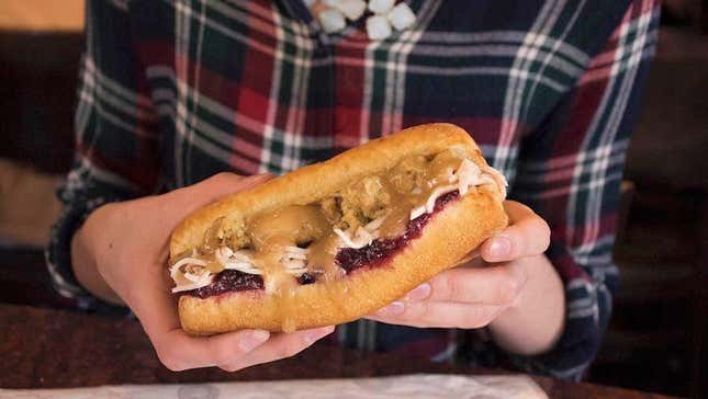 hands holding thanksgiving sandwich
