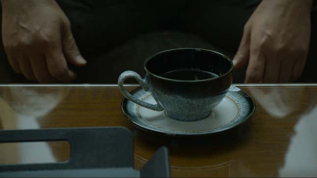 cup of coffee on banker's desk, Squid Game